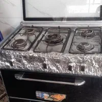 اجاق گاز بخاری جارو برقی میز تلوزیون