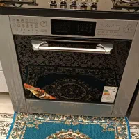 گاز طرح فر و کابینت فلزی و میز ۴ نفره