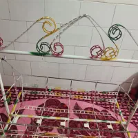 گهواره سفید فلزی