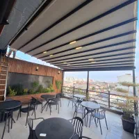 سقف متحرک.کرکره برقی .سایبان برقی .جک پارکینگ