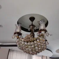 ۲ جفت لوستر ،آینه وشمعدان ،ساعت ایستاده کارتیر