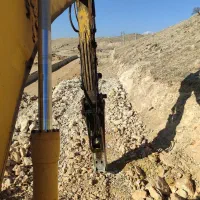 راننده بیل مکانیکی هستم