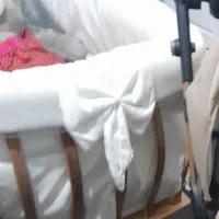 گهواره و تخت کنار مادر