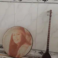 یک عدد دف یک عدد سه تار