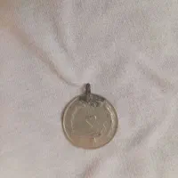 سکه ۵ ریالی شاهنشاهی جنسش از نقره هست