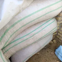 کاه درجه یک  گونی زده شده تمیز تقریبا یک تن نیم