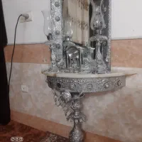 اینه وشمعدان وساعت