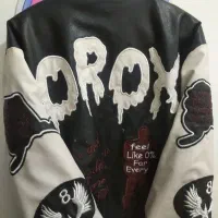 کاپشن چرم پسرانه قد 60قد آستین 50