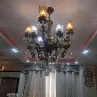 لوستر برنج ۸ شاخه مدل فرشته سیاه قلم