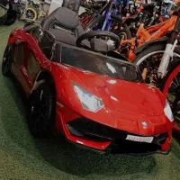 ماشین شارژی لوکس درب به بالابازشو متالیک