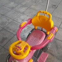ماشین بچه چهار چرخ دسته دار و عروسک خرسی بزرگ|اسباب‌‌بازی|اندیشه, اندیشه فاز ۱|دیوار