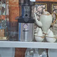 یک عدد دستکاه عصارگیره