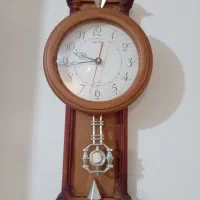 ساعت دیواری طرح چوب