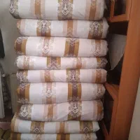 تعدادی تشک و لحاف دست دوز