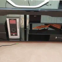 میز تلویزیون شیشه‌ای