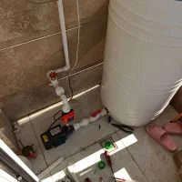 تاسیسات و نصب پمپ و منبع ( تعمیرات ابگرمکن)