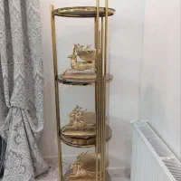 ویترین چهار طبقه طلایی به همراه ست گوزن پرشی