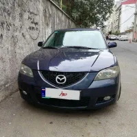مزدا 3 قدیم سورمه ای