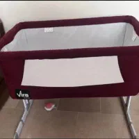 گهواره کنار مادر