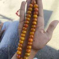 تسبیح کهربا پرچم