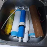 بازبست کردن ونصب .وتعویض فیلترها دستگاه تضفیه|آب‌سردکن و تصفیه آب|رشت, نامجو|دیوار