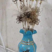 گل مصنوعی به همراه گلدون