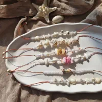 دستبند های صدفی با نخ و گره کشویی