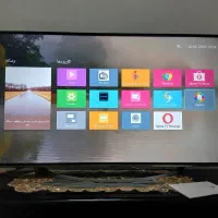 تلویزیون هوشمند با میز تلویزیون در شهریار|تلویزیون و پروژکتور|شاهدشهر, |دیوار