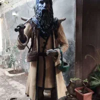 مجسمه بتنی درویش