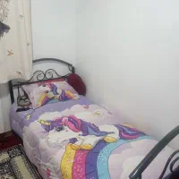 تخت خواب و روتختی