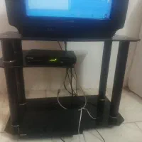 تلویزیون همراه با دستگاه دیجیتال و دی وی دی