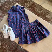 ست تاپ و دامن سرمه‌ای با طرح آلبالو