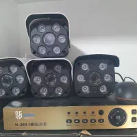 دستگاه ۸کانال با هارد و چهار عدد دوربین مداربسته