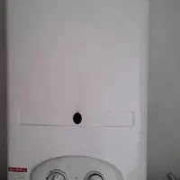 ابگرمکن دیواری ایران شرق  سالم و سرویس شده کامل