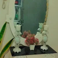 یک‌عدد بوفه و‌اینه و‌میز