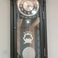 ساعت دیواری آونگ دار