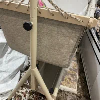 تخت و ننو  کنار مادر