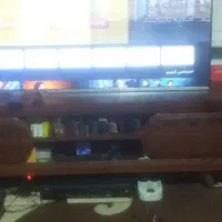 ماشین لباس شویی، یخچال، تلوزیون،جاکفشی،میز تلوزی