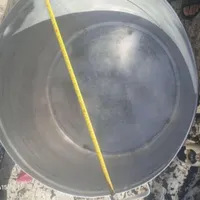 دیگ بزرگ و اجاق نذری همراه ظروف وکف گیر چوبی