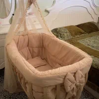 یه سری لوازم نوزاد، روروک، ساک حمل،پتو، ست خواب