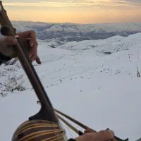 نوازنده کمانچه، دف و تمبک