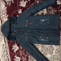 کاپشن در حد نو هم سایز لارج دارم هم همین شکل xلارج