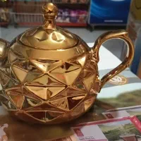 قوری طلایی مدل اناناسی