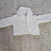 کت عروس، تاج عروس و تور.|لباس|فردیس, منظریه|دیوار