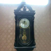 ساعت دیواری چوبی در حدنو