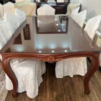 میز نهار خوری ۸ نفره با شیشه در حد نو