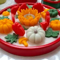 شمع یلدایی همراه با کاسه سازه سنگ مصنوعی سرامیکی