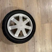 چرخ عقب و جلو کالسکه کویینی باز quinny