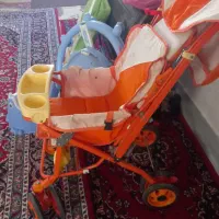کالسکه . صندلی دستشویی کودک . نی نی لای لای .