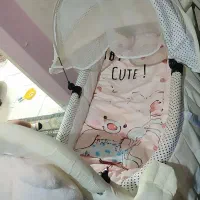 تخت کنار مادر برا نوزاد